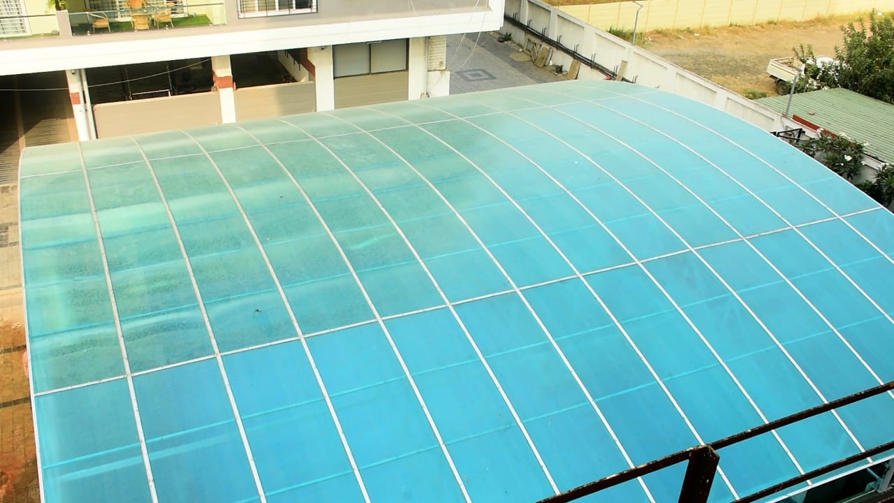 Blue translucent roof canopy at a project site